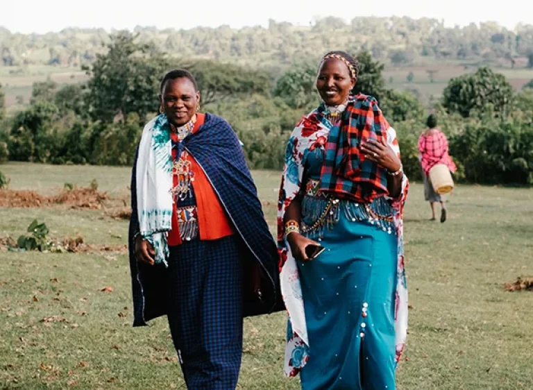 A photo of two happy women in kenya